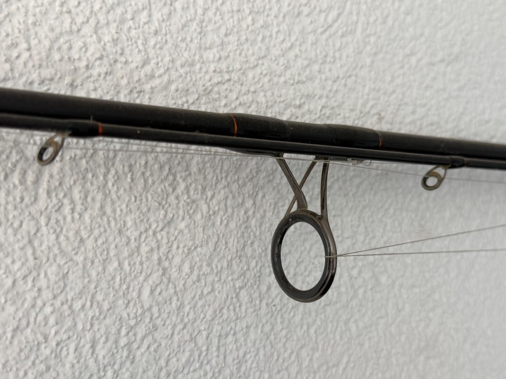 Rod guide insert inside a fishing rod guide