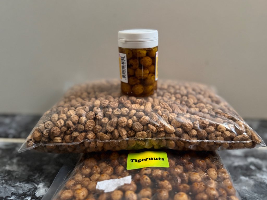 Why are tiger nuts banned at some fisheries? Dry and prepared tiger nuts shown together.
