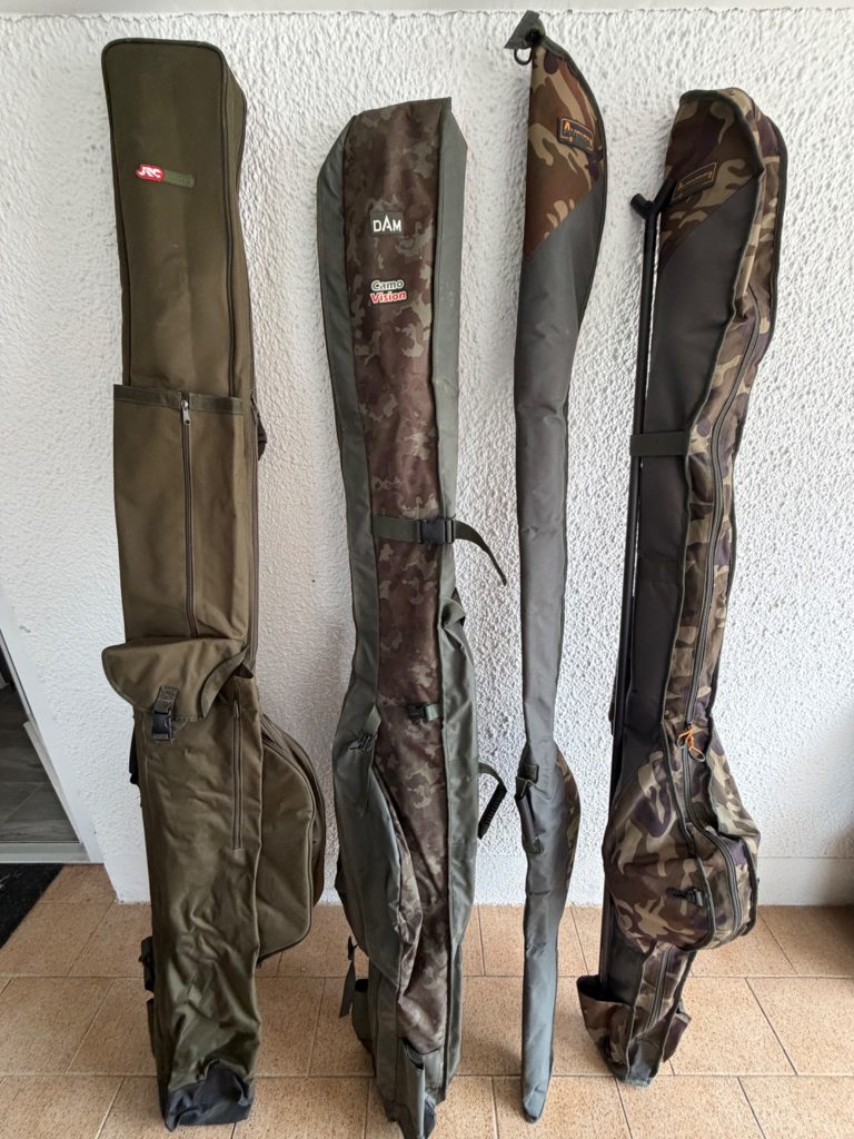 Four fishing rod bags stored upright against a wall