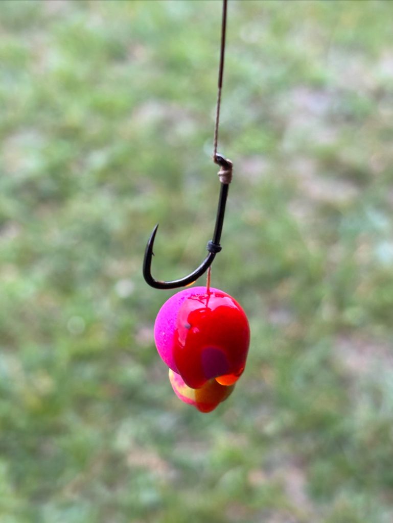 Fishing hook with a simple bait presentation ready for fishing
